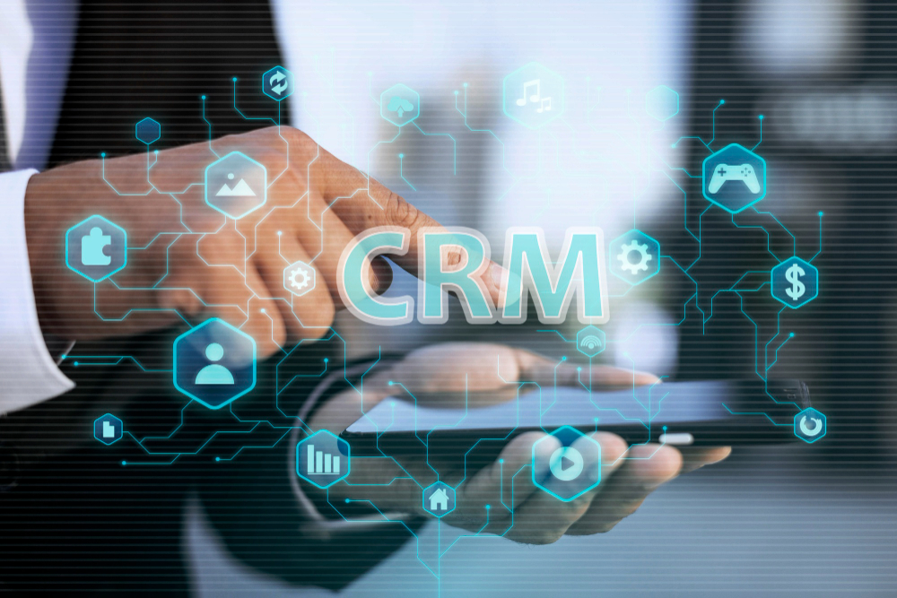 A man using CRM to improve member engagement and retention.